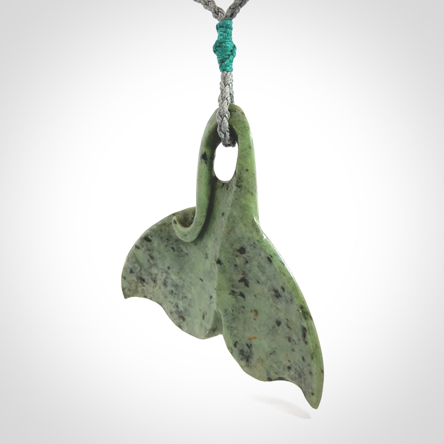 Hand carved New Zealand Jade whale tail pendant