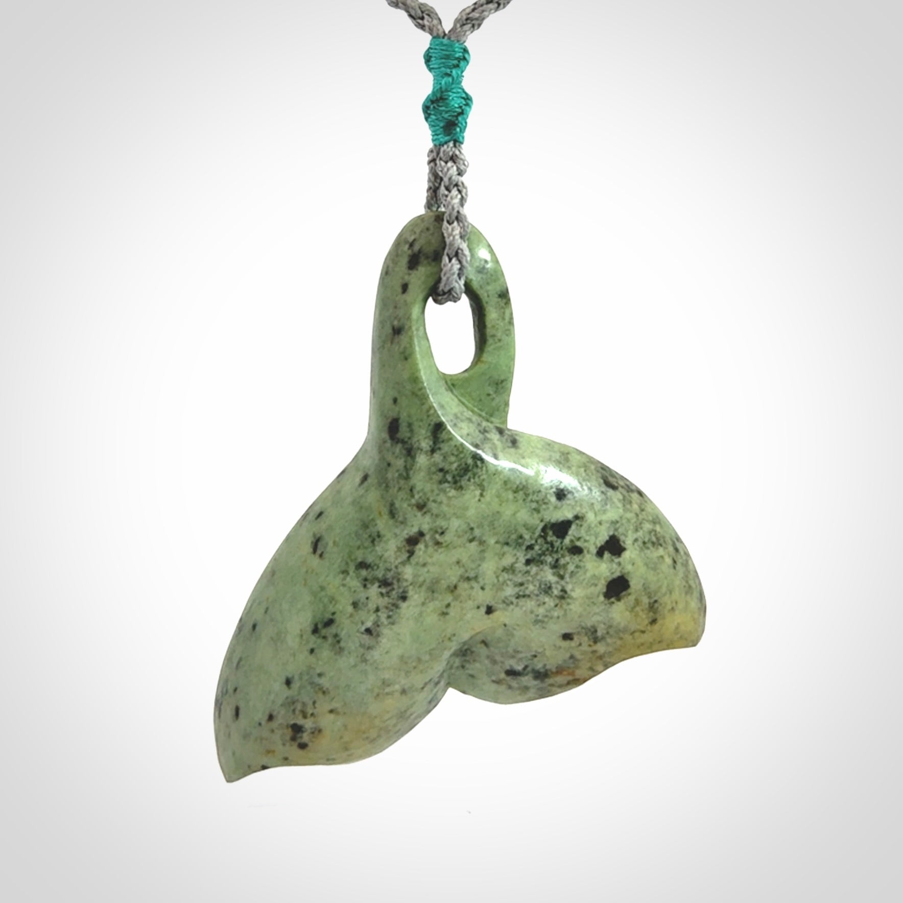 Hand carved New Zealand Jade whale tail pendant