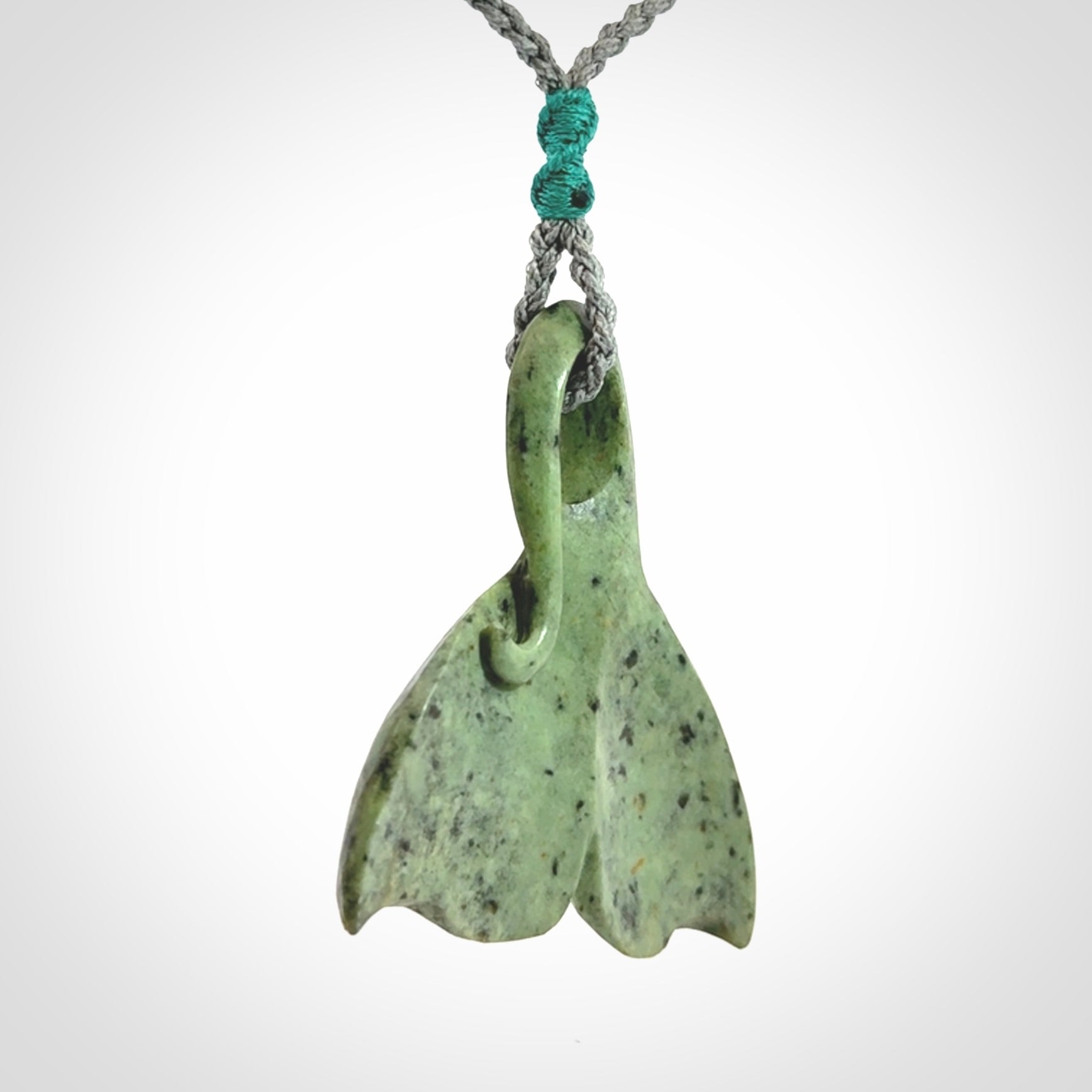 Hand carved New Zealand Jade whale tail pendant