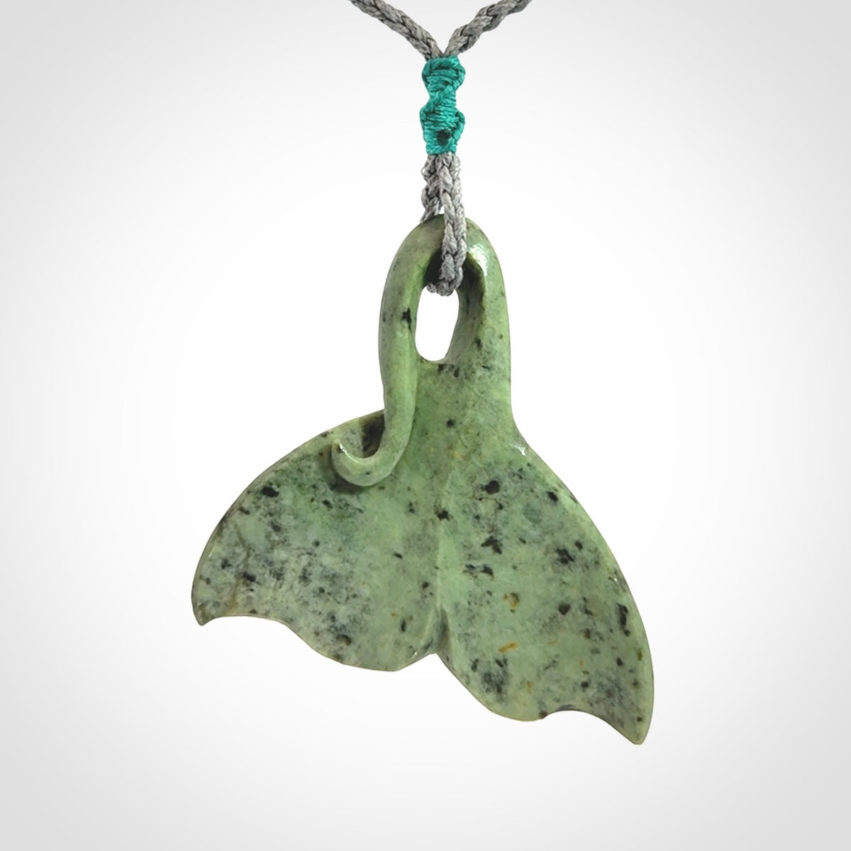 Hand carved New Zealand Jade whale tail pendant