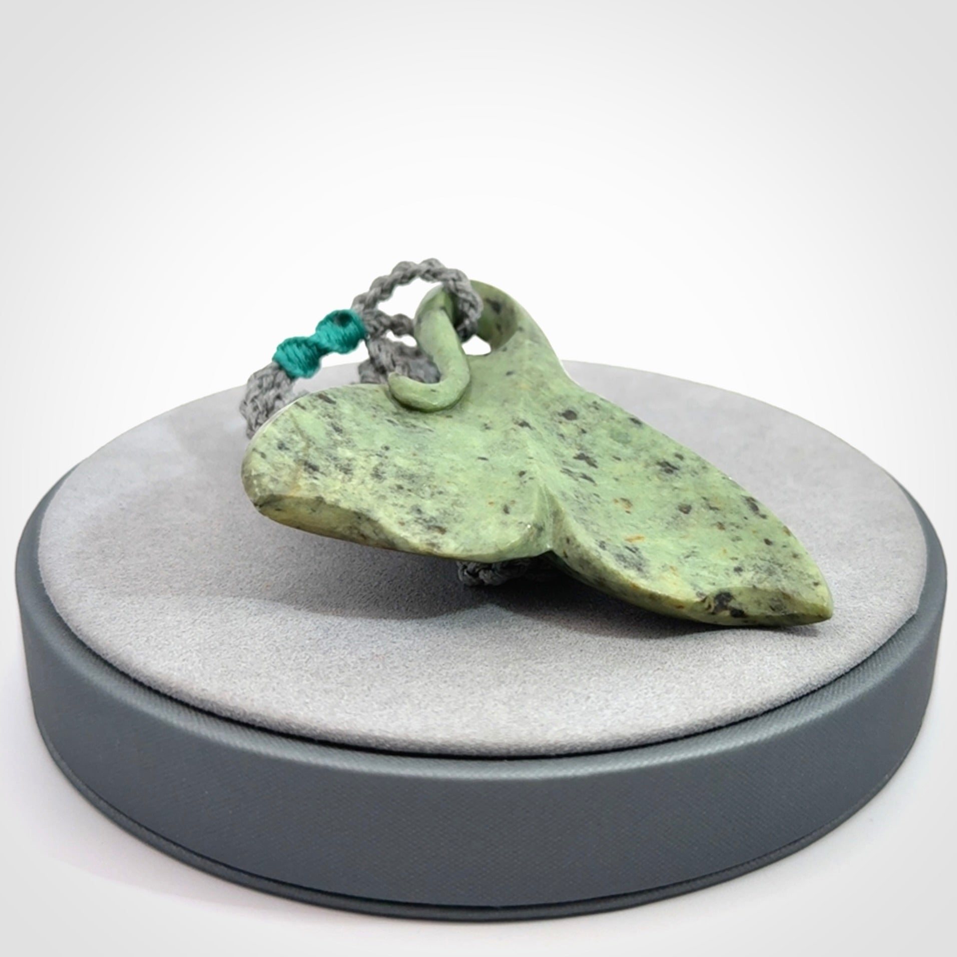 Hand carved New Zealand Jade whale tail pendant