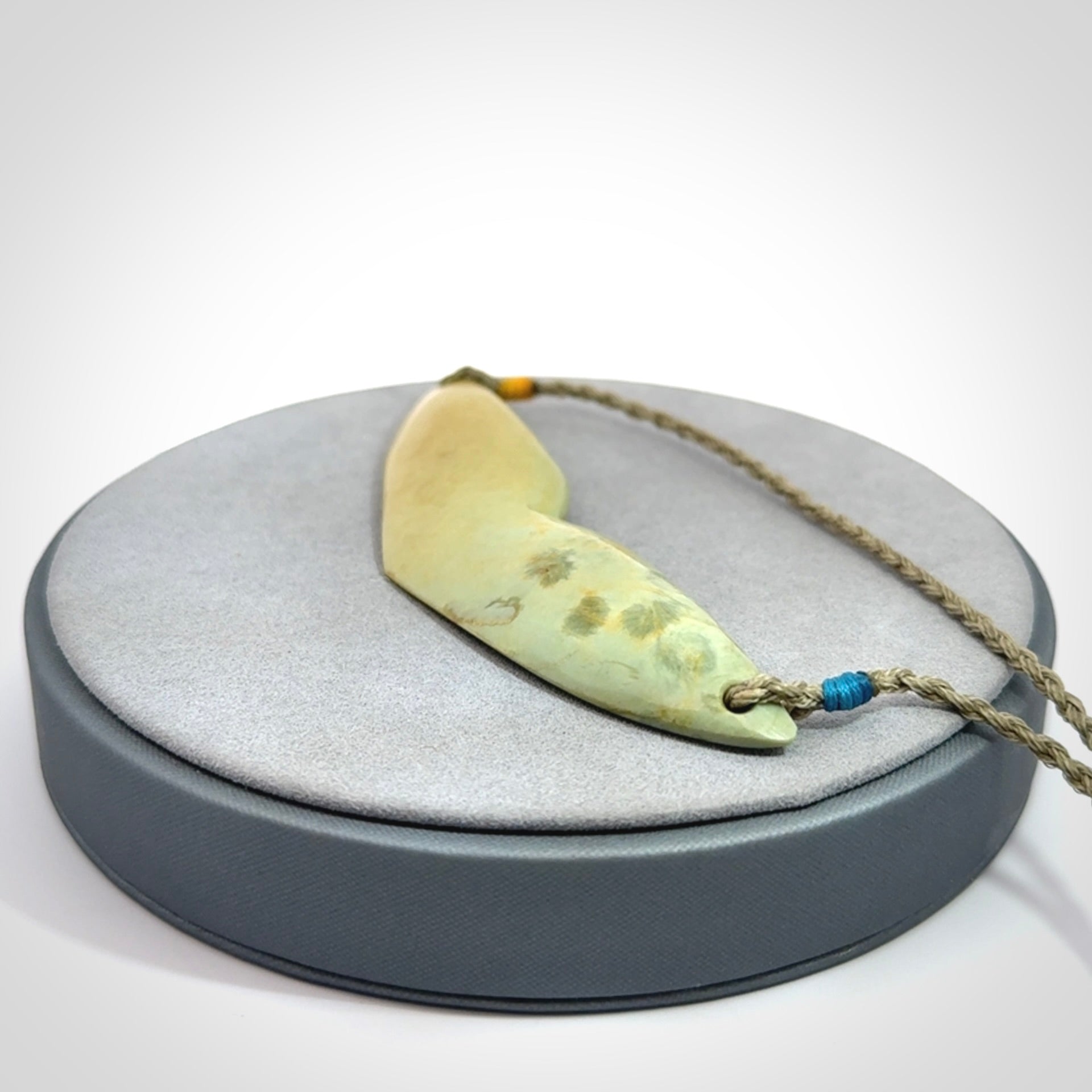 Hand carved New Zealand Flower Jade whale tail pendant