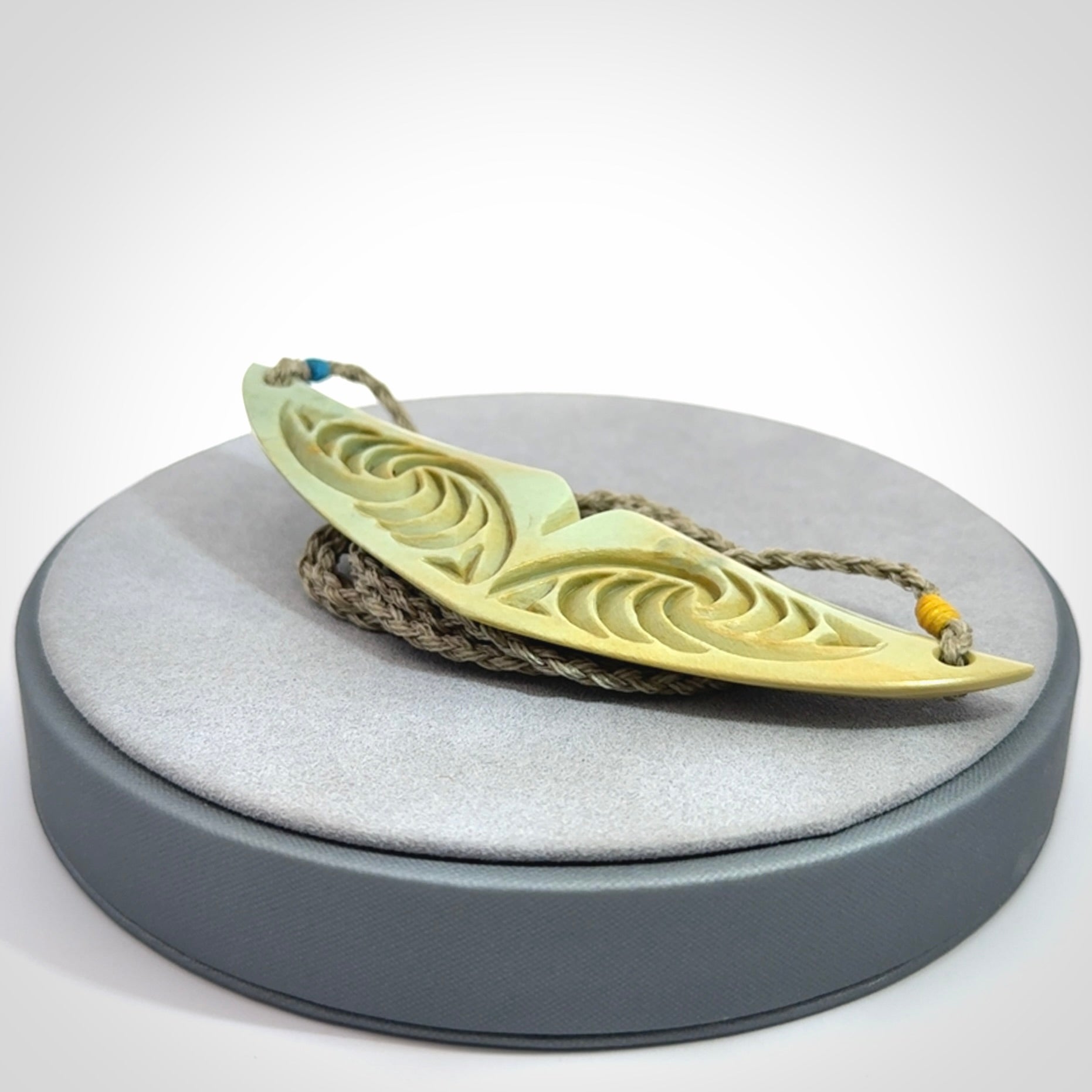 Hand carved New Zealand Flower Jade whale tail pendant