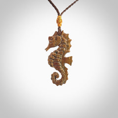 This little pendant is a beautifully carved seahorse pendant made from ancient woolly mammoth tusk. We have designed this so that it can be worn as a pendant, or as a little charm. Made by NZ Pacific and for sale worldwide on our website. Free Postage wherever you are.