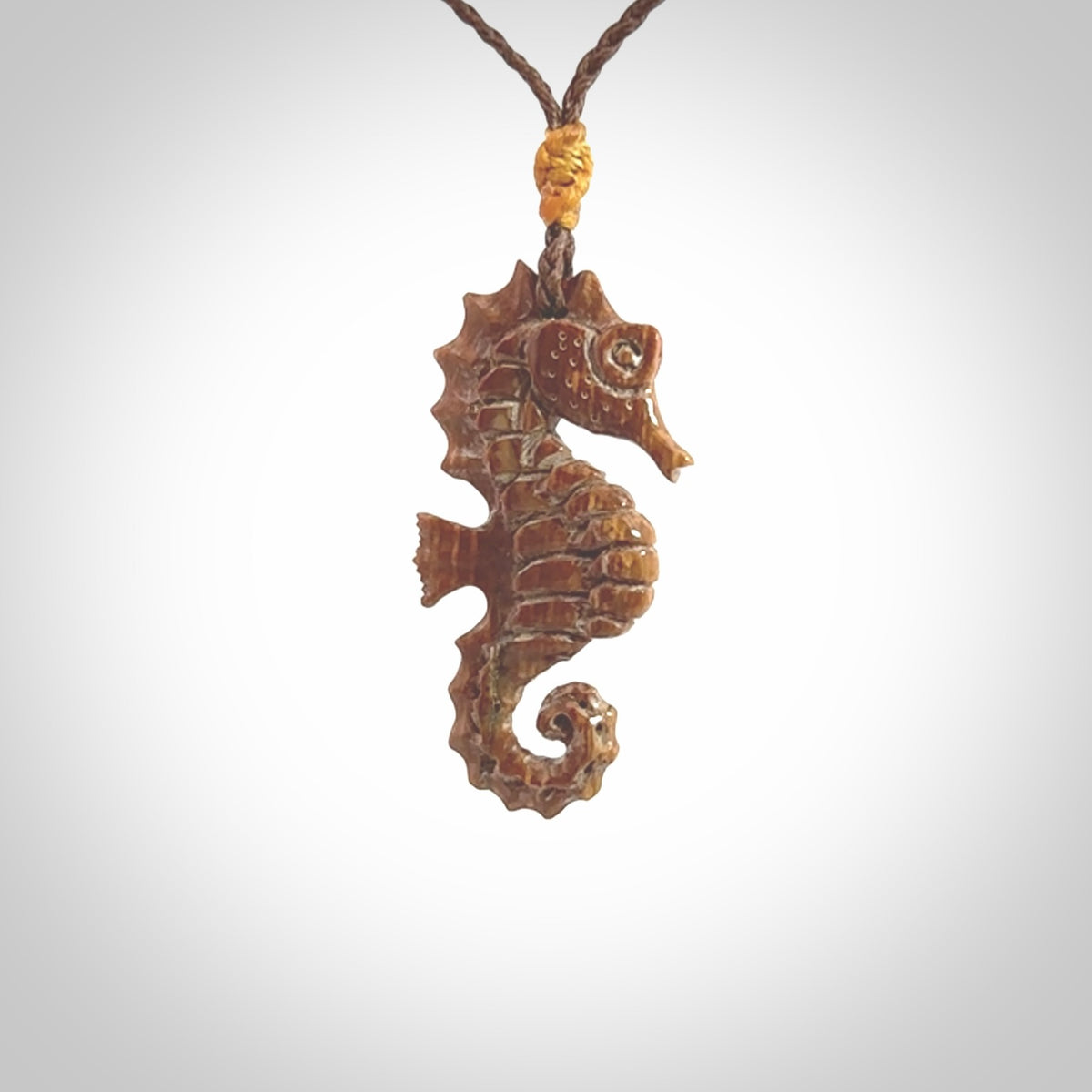 This little pendant is a beautifully carved seahorse pendant made from ancient woolly mammoth tusk. We have designed this so that it can be worn as a pendant, or as a little charm. Made by NZ Pacific and for sale worldwide on our website. Free Postage wherever you are.