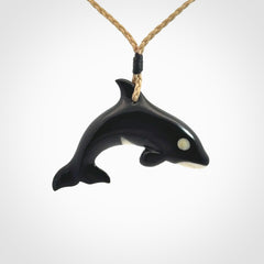 Hand carved black jade and bone Orca pendant. Ocean themed pendants hand carved from natural materials by NZ Pacific. Unique handmade jewellery.