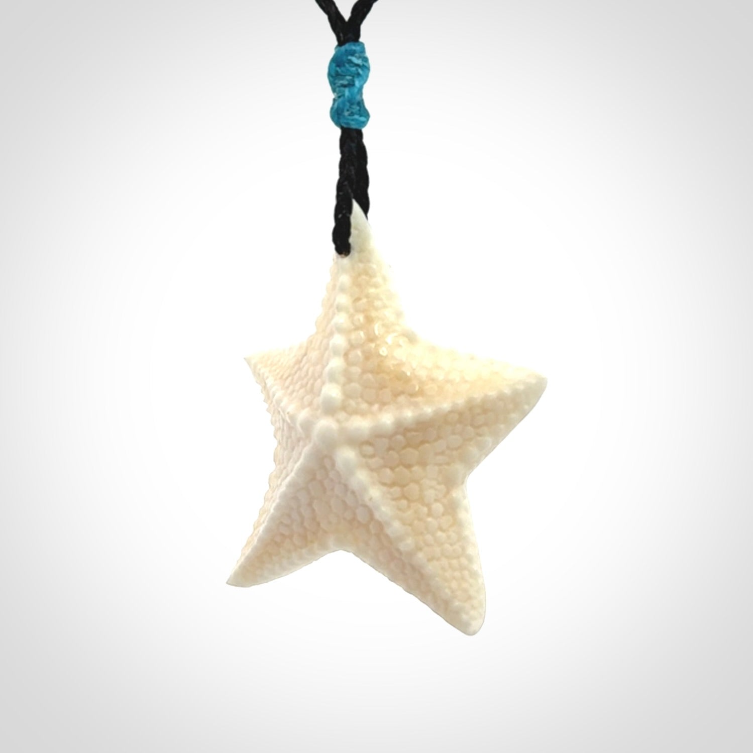 Hand carved bone starfish pendants