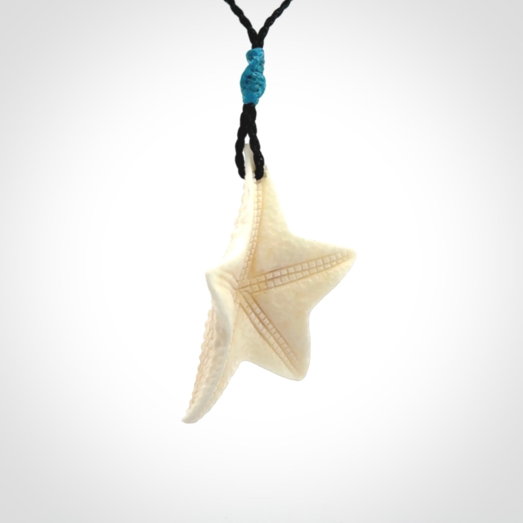 Hand carved bone starfish pendants