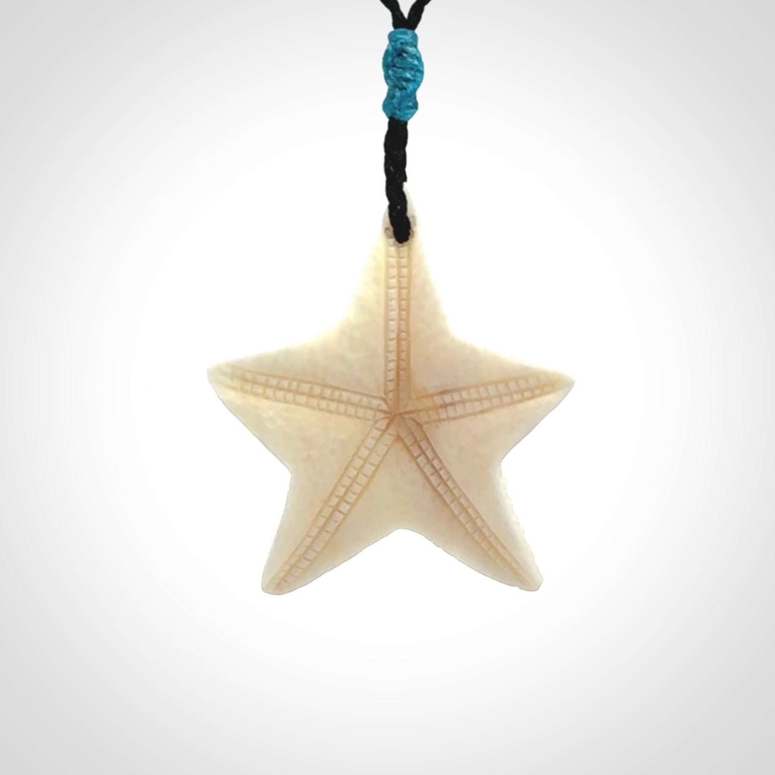 Hand carved bone starfish pendants