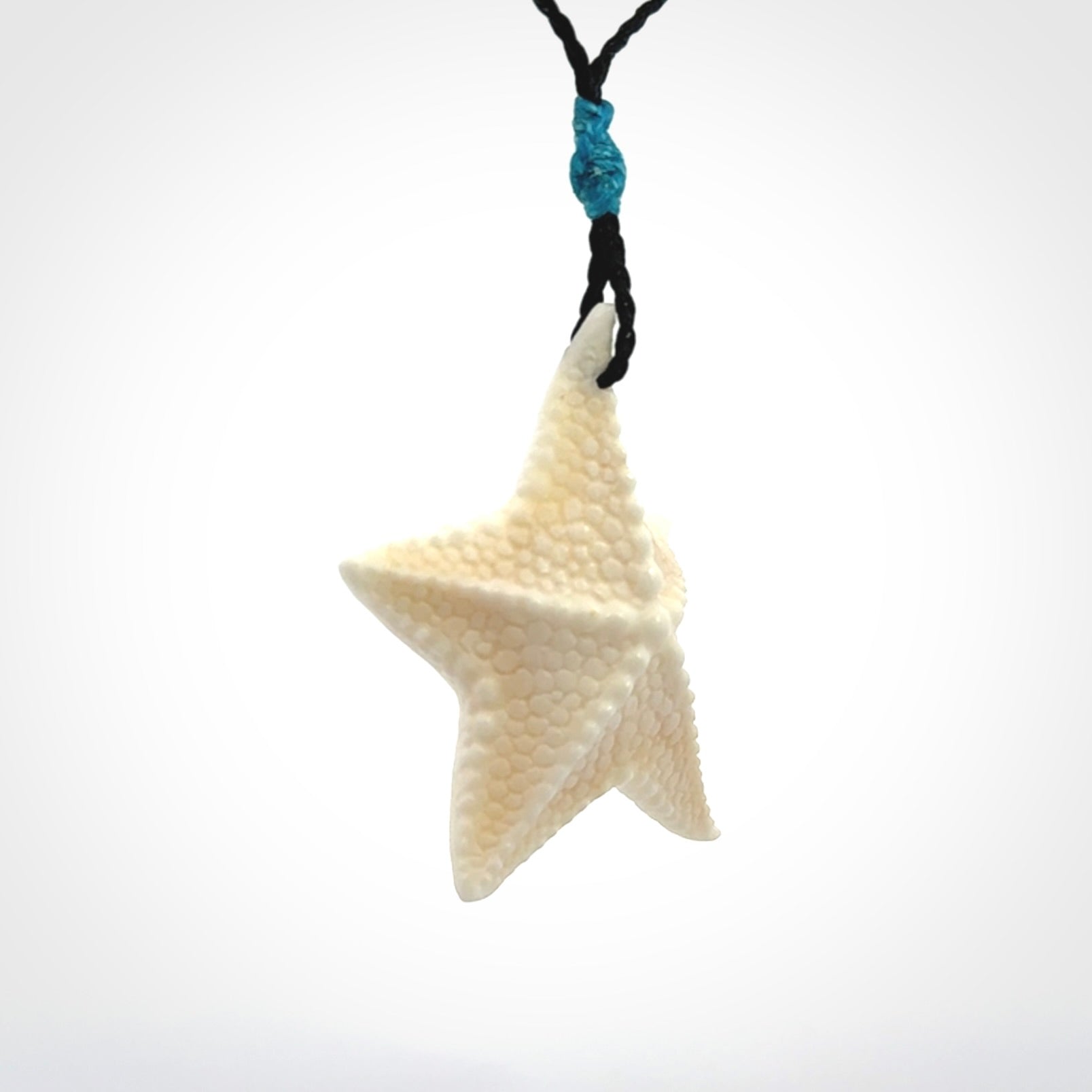 Hand carved bone starfish pendants