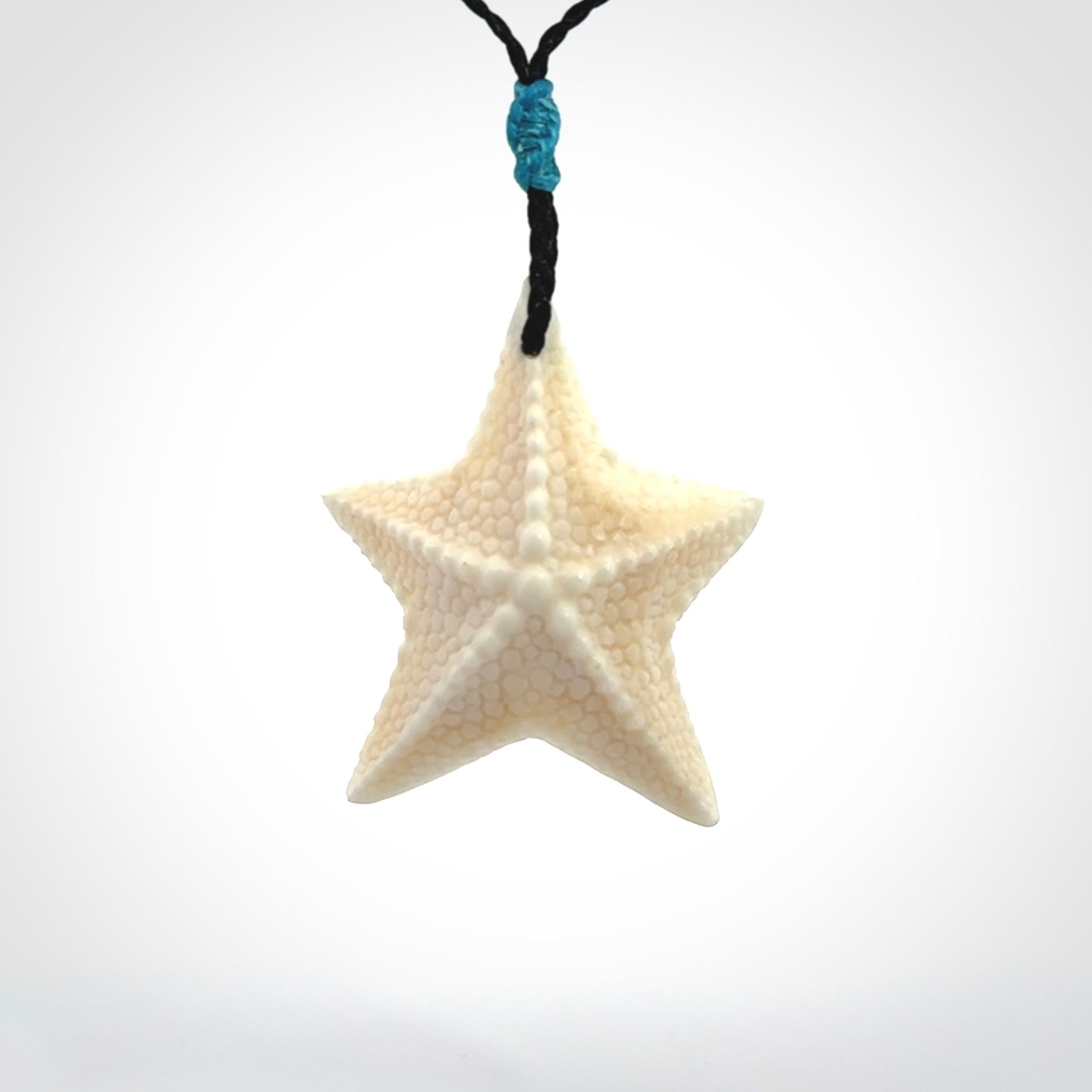 Hand carved bone starfish pendants