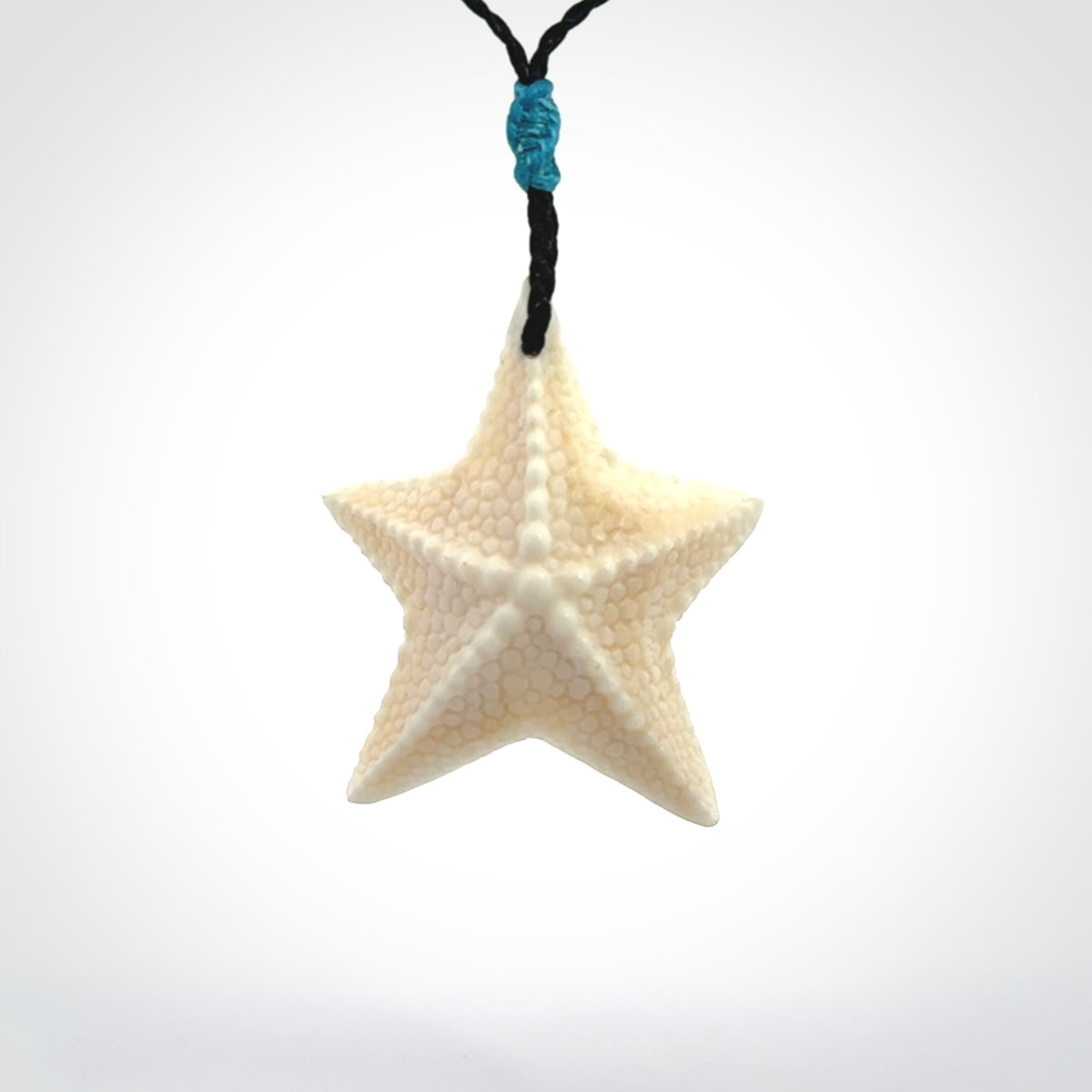 Hand carved bone starfish pendants
