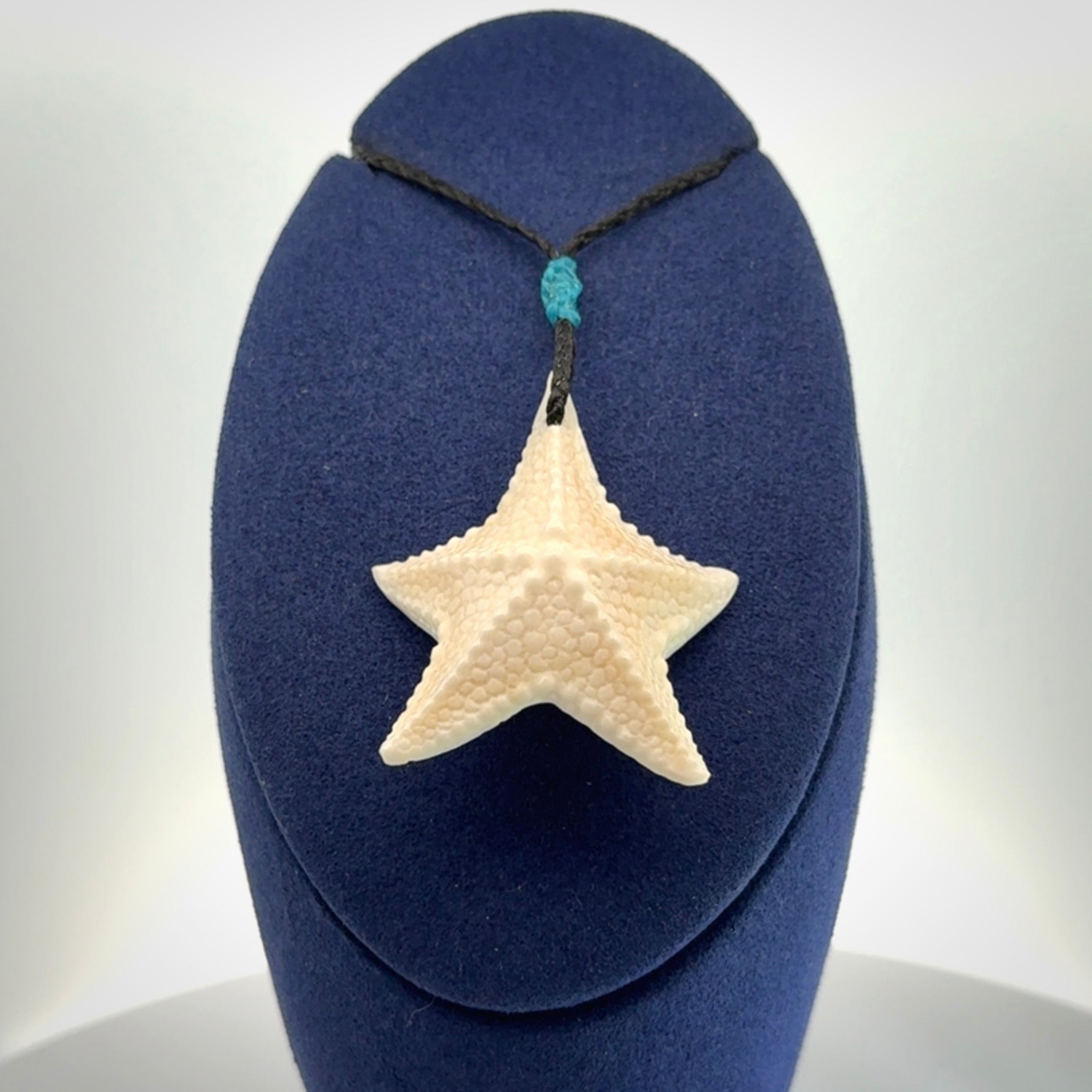 Hand carved bone starfish pendants