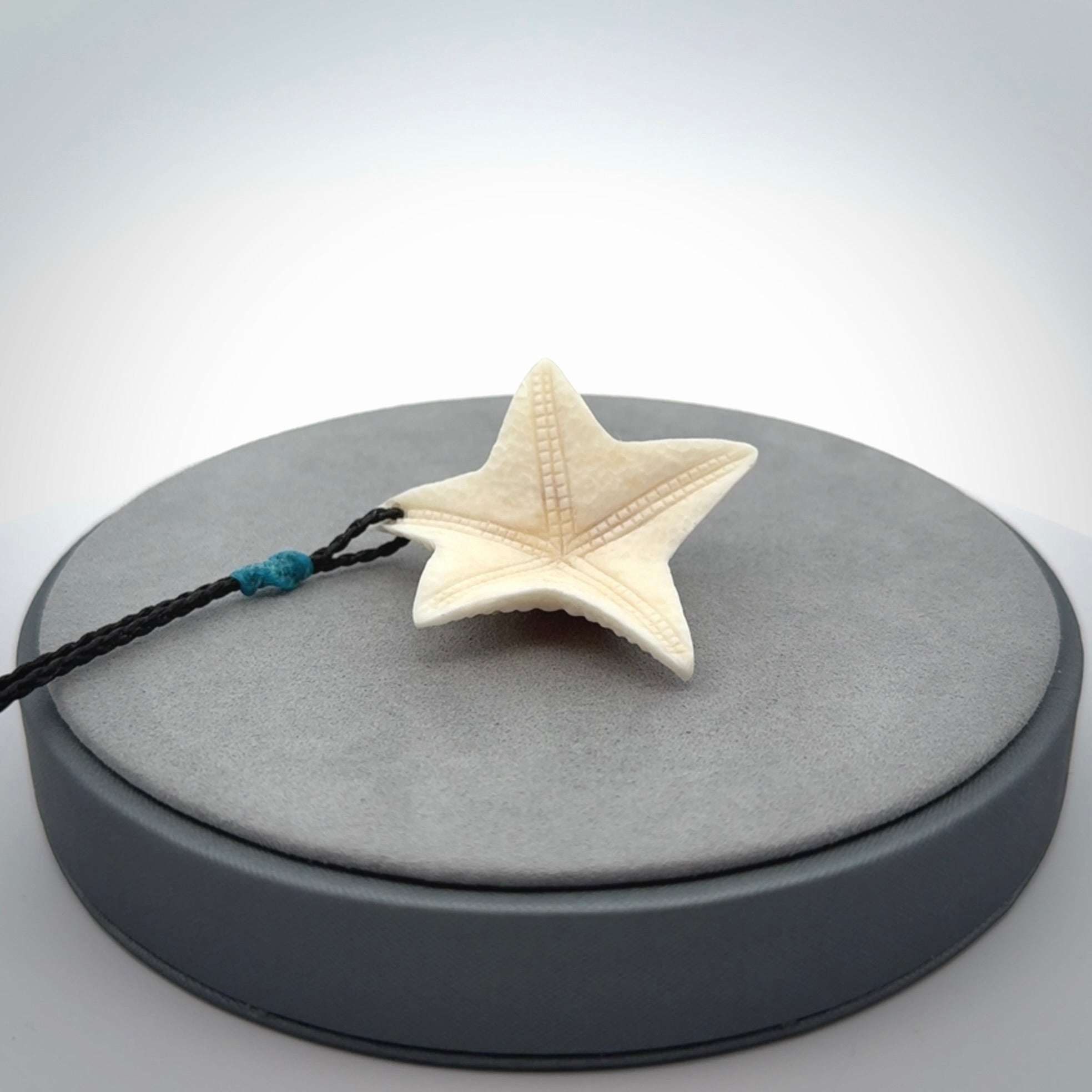 Hand carved bone starfish pendants