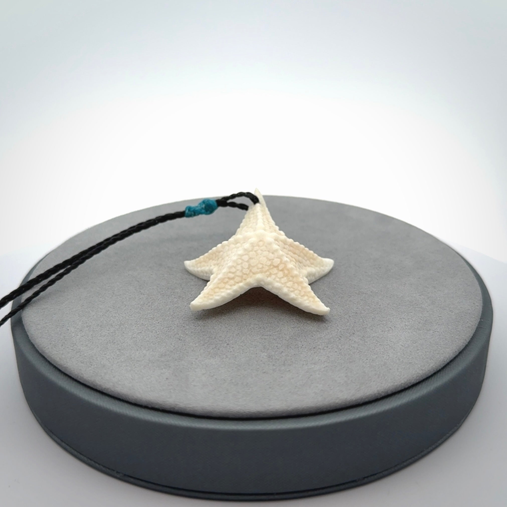 Hand carved bone starfish pendants