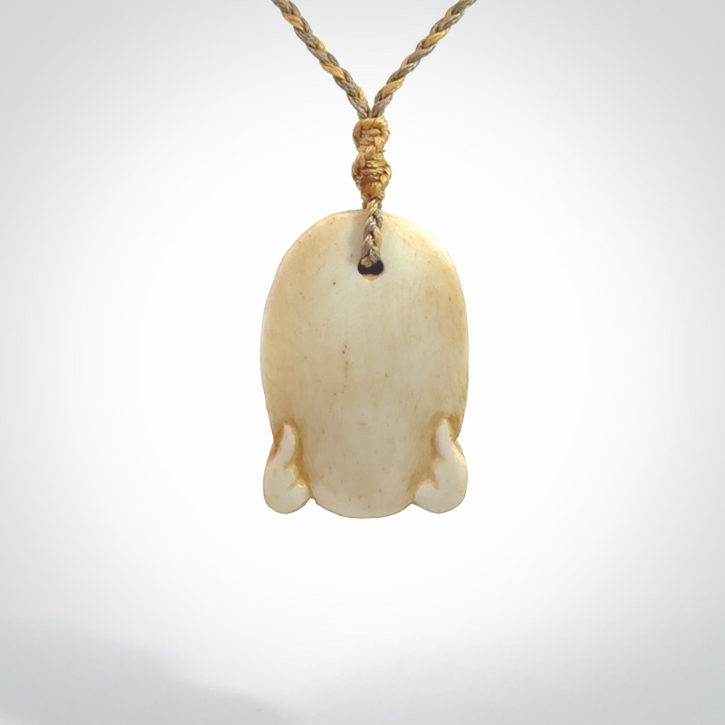 Hand carved incredible stained bone gargoyle face carving. A stunning work of art. This pendant was hand carved in bone with buffalo horn inlay for the eyes by Yuri Terenyi. A one off collectors item that has been hand crafted to be worn or displayed.