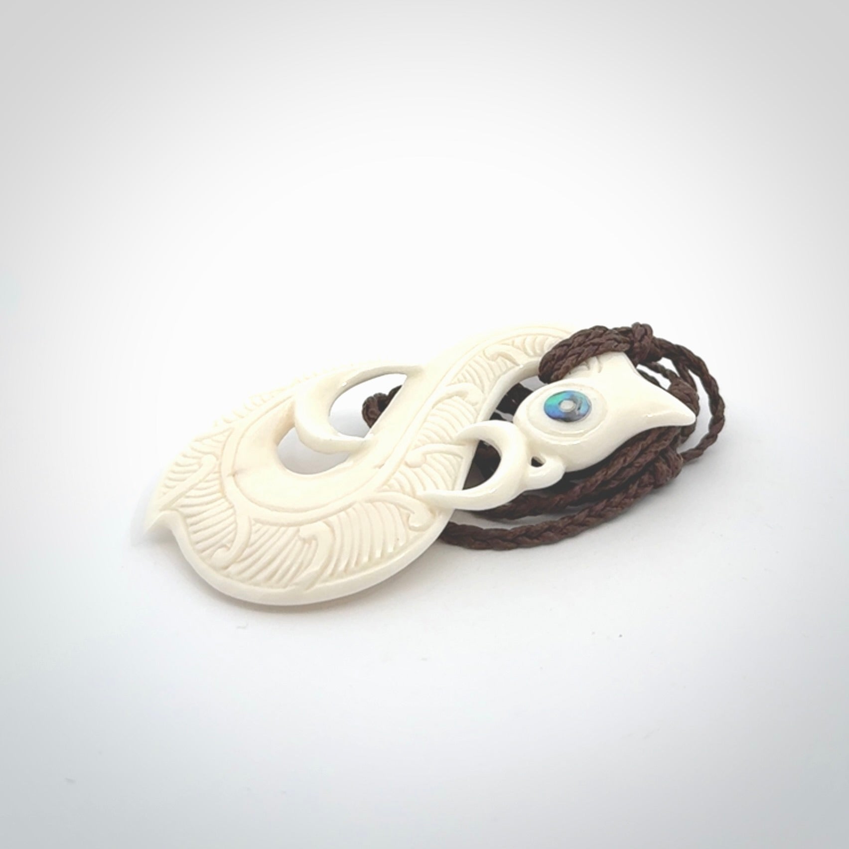 Hand carved bone manaia pendant. Made by NZ Pacific and for sale online. Free worldwide shipping.