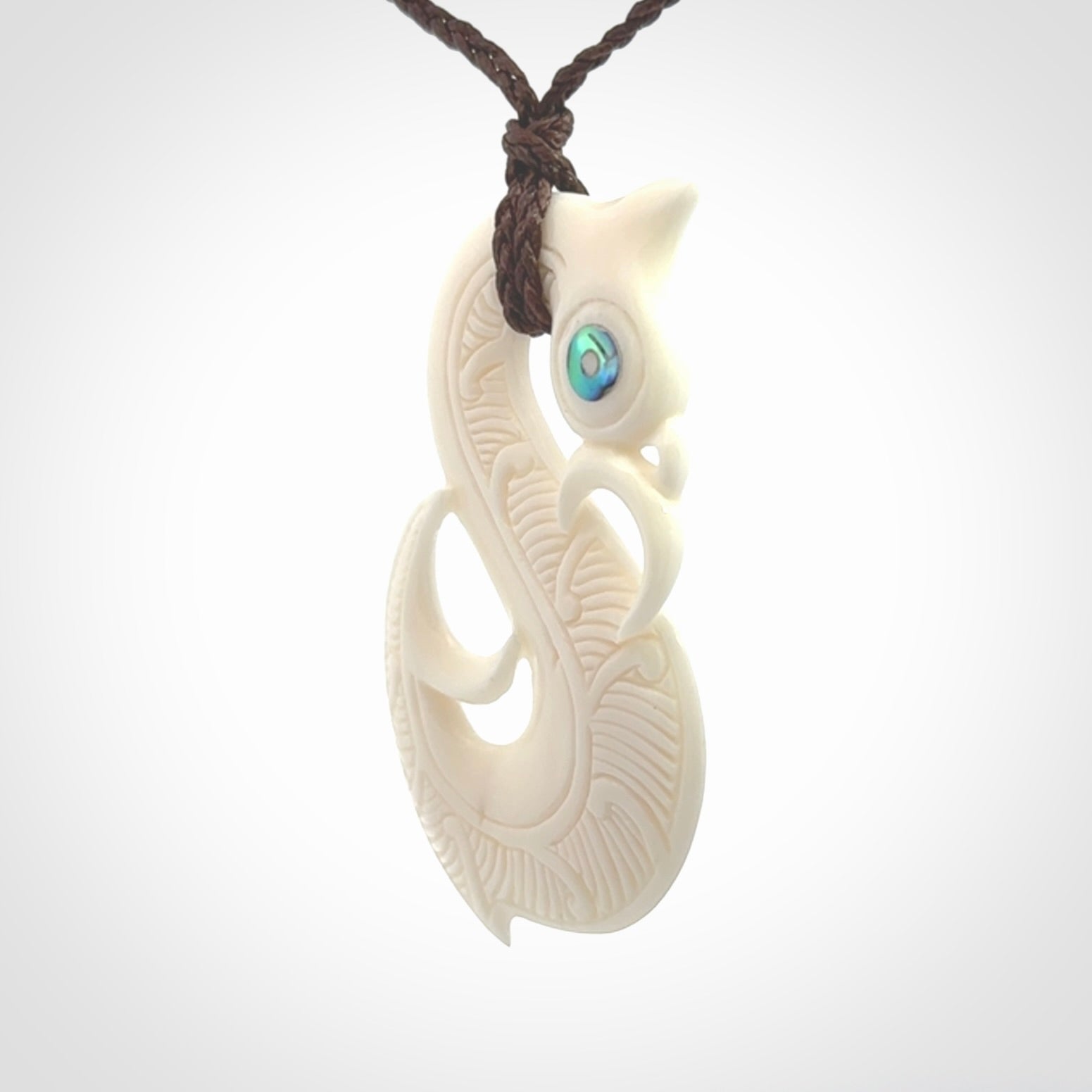 Hand carved bone manaia pendant. Made by NZ Pacific and for sale online. Free worldwide shipping.