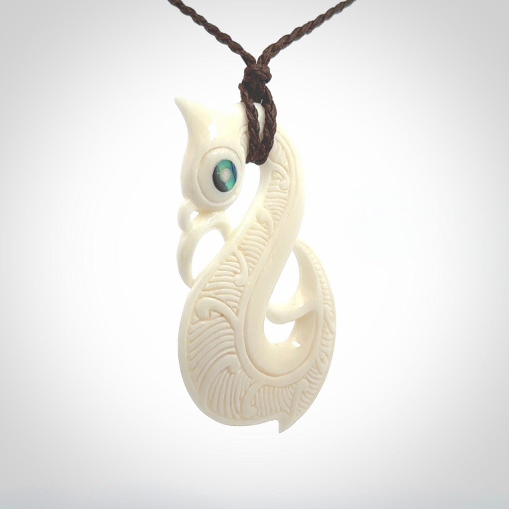 Hand carved bone manaia pendant. Made by NZ Pacific and for sale online. Free worldwide shipping.