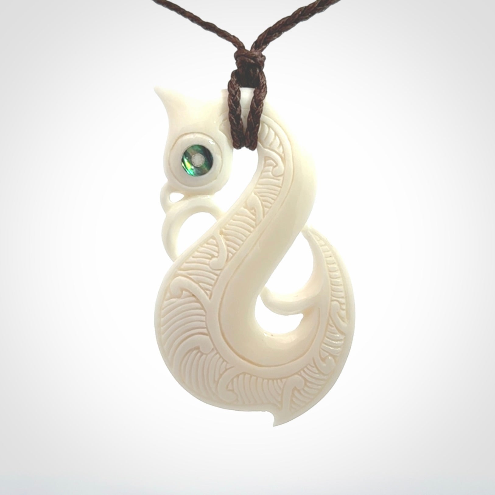 Hand carved bone manaia pendant. Made by NZ Pacific and for sale online. Free worldwide shipping.
