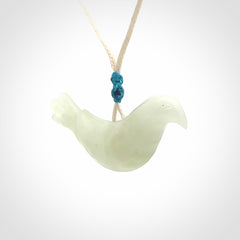 This pendant is a hand carved contemporary dove bird pendant. Carved in jadeite stone. It is a finely shaped piece with gentle and soft lines and is a great representation of the peace that doves traditionally represent. We ship these worldwide with express courier. A fantastic and meaningful gift.
