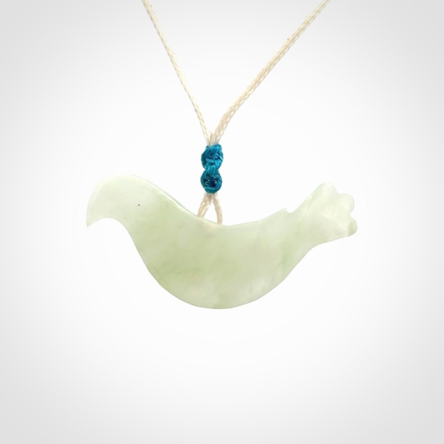 This pendant is a hand carved contemporary dove bird pendant. Carved in jadeite stone. It is a finely shaped piece with gentle and soft lines and is a great representation of the peace that doves traditionally represent. We ship these worldwide with express courier. A fantastic and meaningful gift.