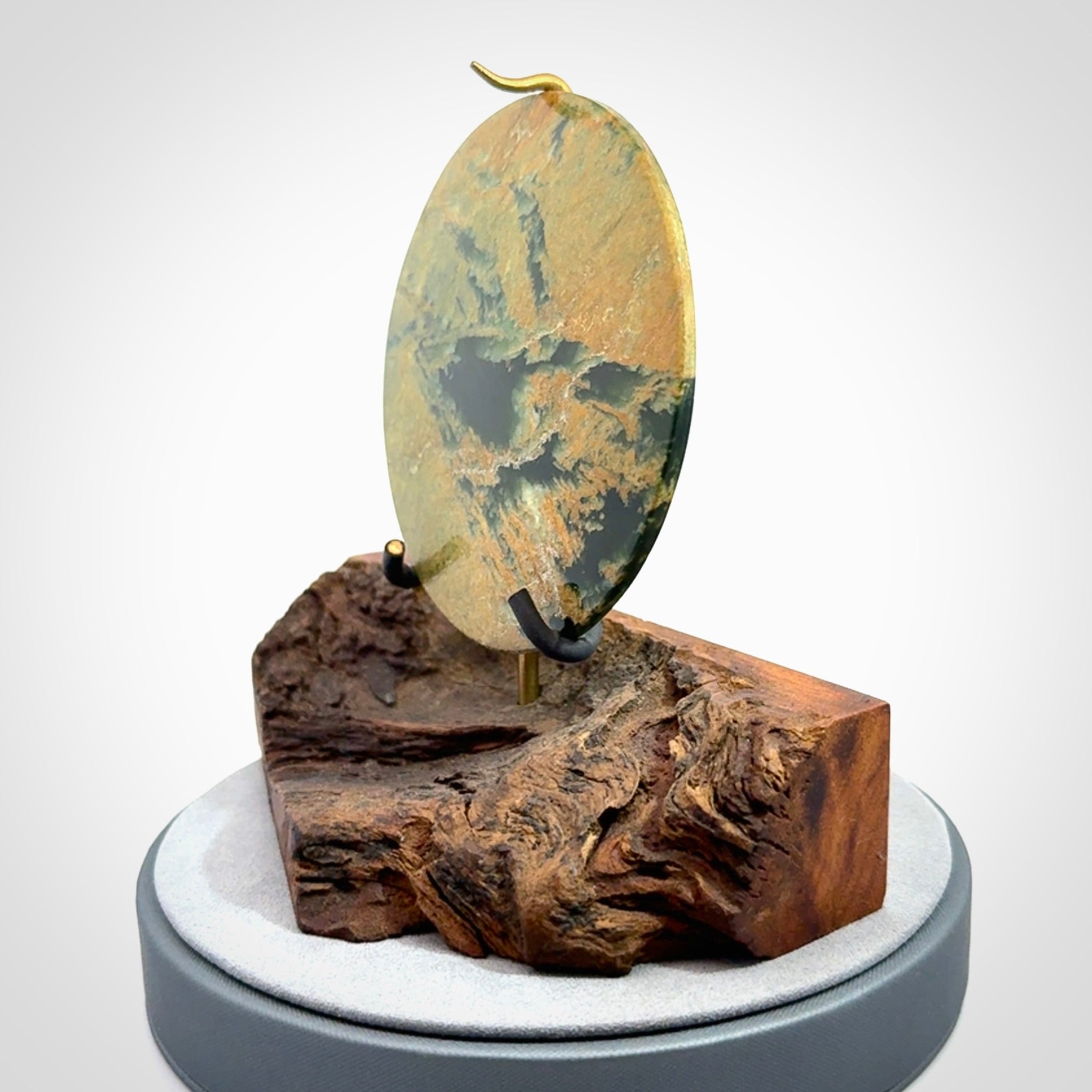 Hand carved New Zealand Flower Jade Disc with wooden stand sculpture. Hand carved here in New Zealand by Alex Sands Studio. This is a 'one only' sculpture, a beautiful display piece.
