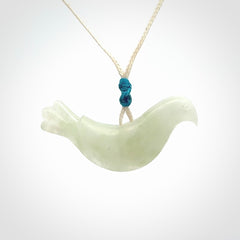 This pendant is a hand carved contemporary dove bird pendant. Carved in jadeite stone. It is a finely shaped piece with gentle and soft lines and is a great representation of the peace that doves traditionally represent. We ship these worldwide with express courier. A fantastic and meaningful gift.