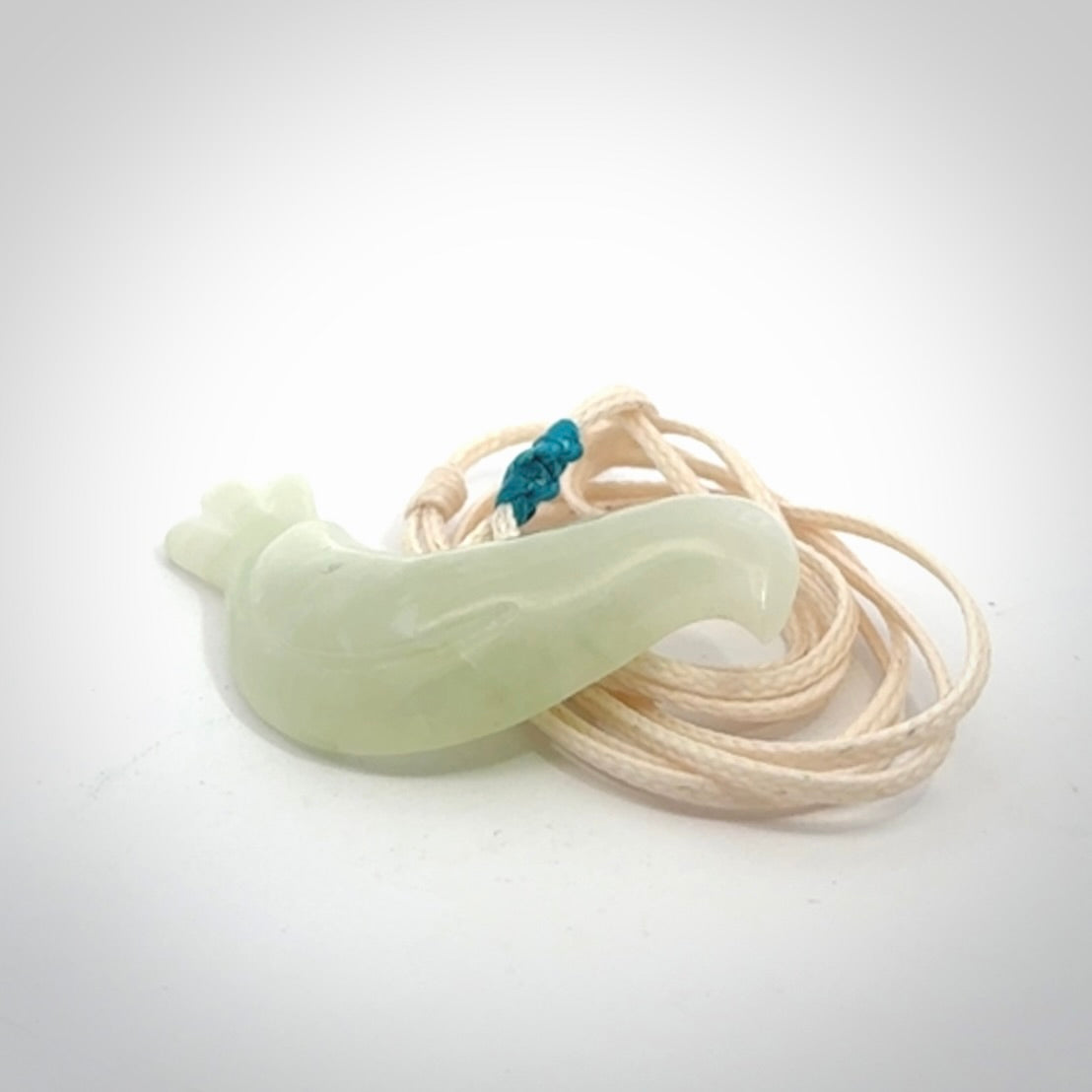 This pendant is a hand carved contemporary dove bird pendant. Carved in jadeite stone. It is a finely shaped piece with gentle and soft lines and is a great representation of the peace that doves traditionally represent. We ship these worldwide with express courier. A fantastic and meaningful gift.