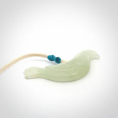 This pendant is a hand carved contemporary dove bird pendant. Carved in jadeite stone. It is a finely shaped piece with gentle and soft lines and is a great representation of the peace that doves traditionally represent. We ship these worldwide with express courier. A fantastic and meaningful gift.