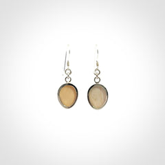 Hand carved Woolly Mammoth Tusk face earrings