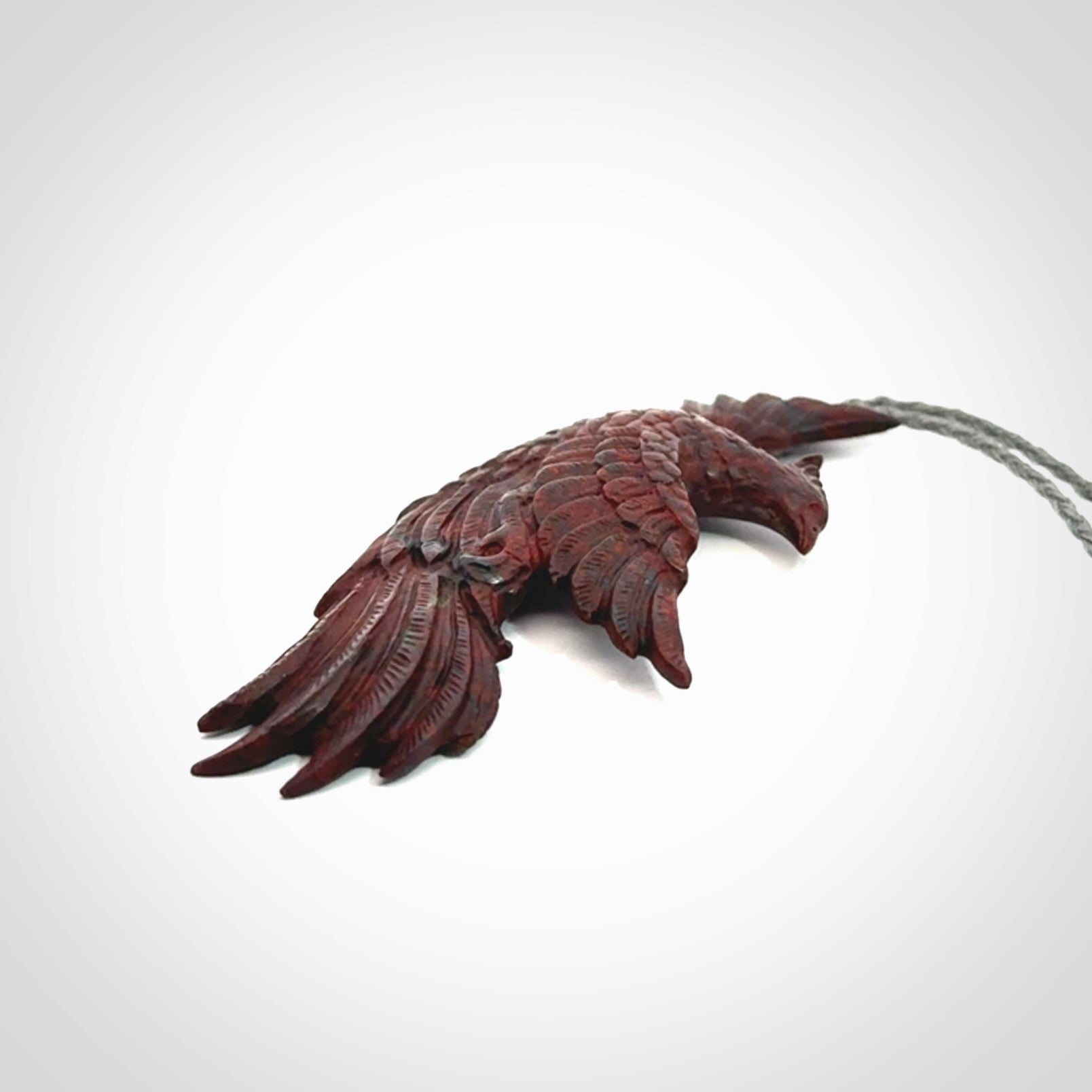 Hand carved jasper phoenix pendant