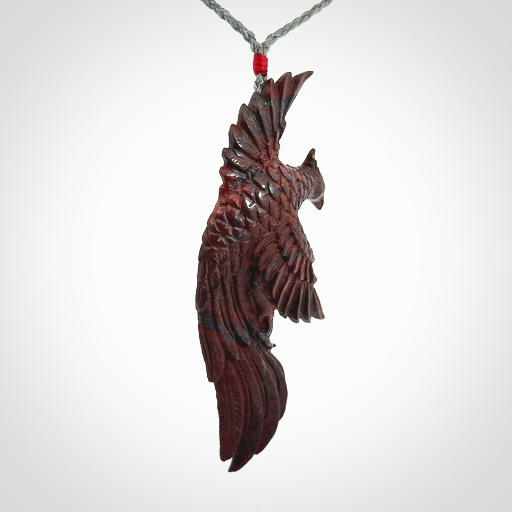 Hand carved jasper phoenix pendant