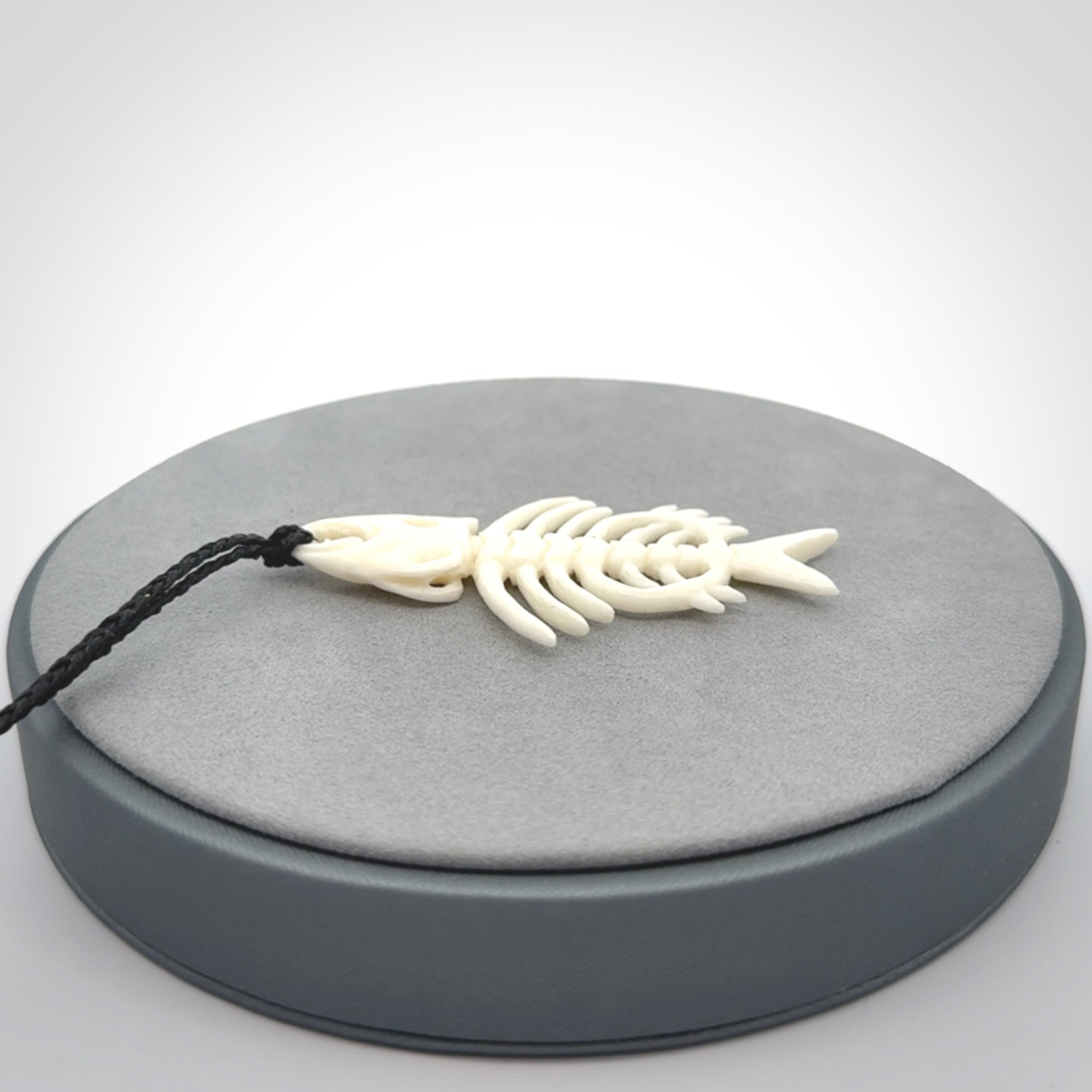 Hand carved bone fish skeleton pendant. Hand made bone fish necklace. Fish themed jewellery. Ocean themed pendant. One only necklace provided with adjustable cord and free delivery.