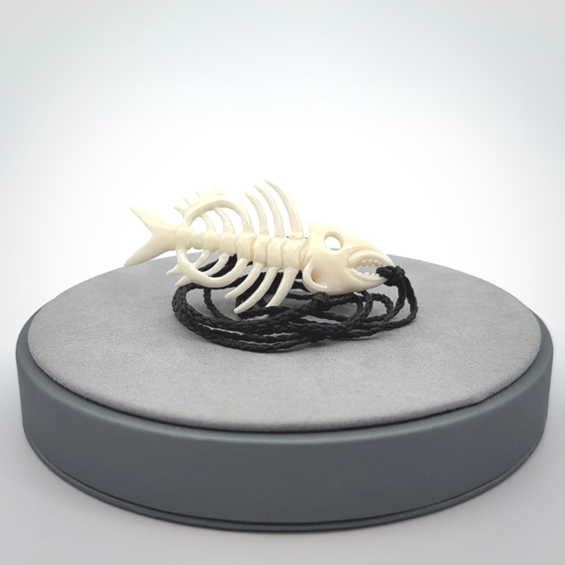 Hand carved bone fish skeleton pendant. Hand made bone fish necklace. Fish themed jewellery. Ocean themed pendant. One only necklace provided with adjustable cord and free delivery.