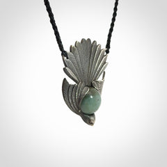 Hand crafted sterling silver fantail pendant with jade insert