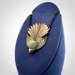 Hand crafted sterling silver fantail pendant with jade insert