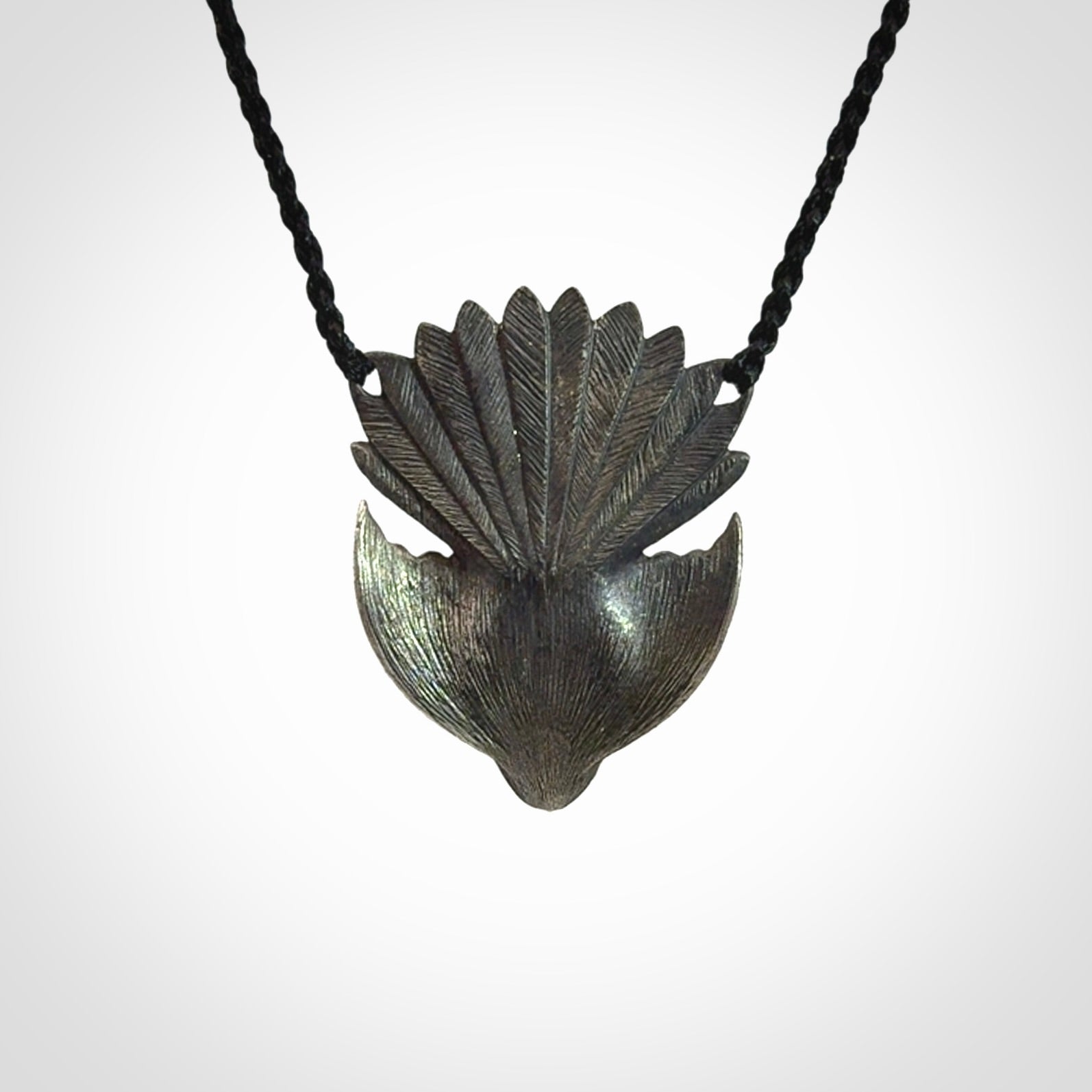 Hand crafted sterling silver fantail pendant with jade insert