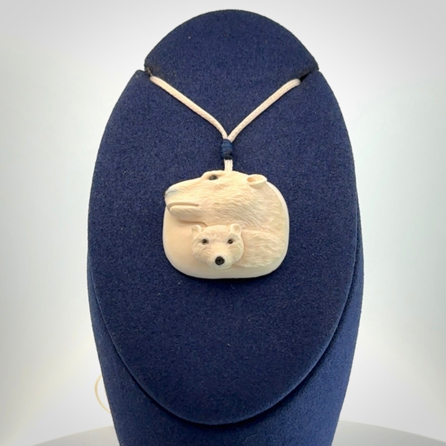 Polar bear pendant Hand Carved in Ancient Woolly Mammoth Tusk