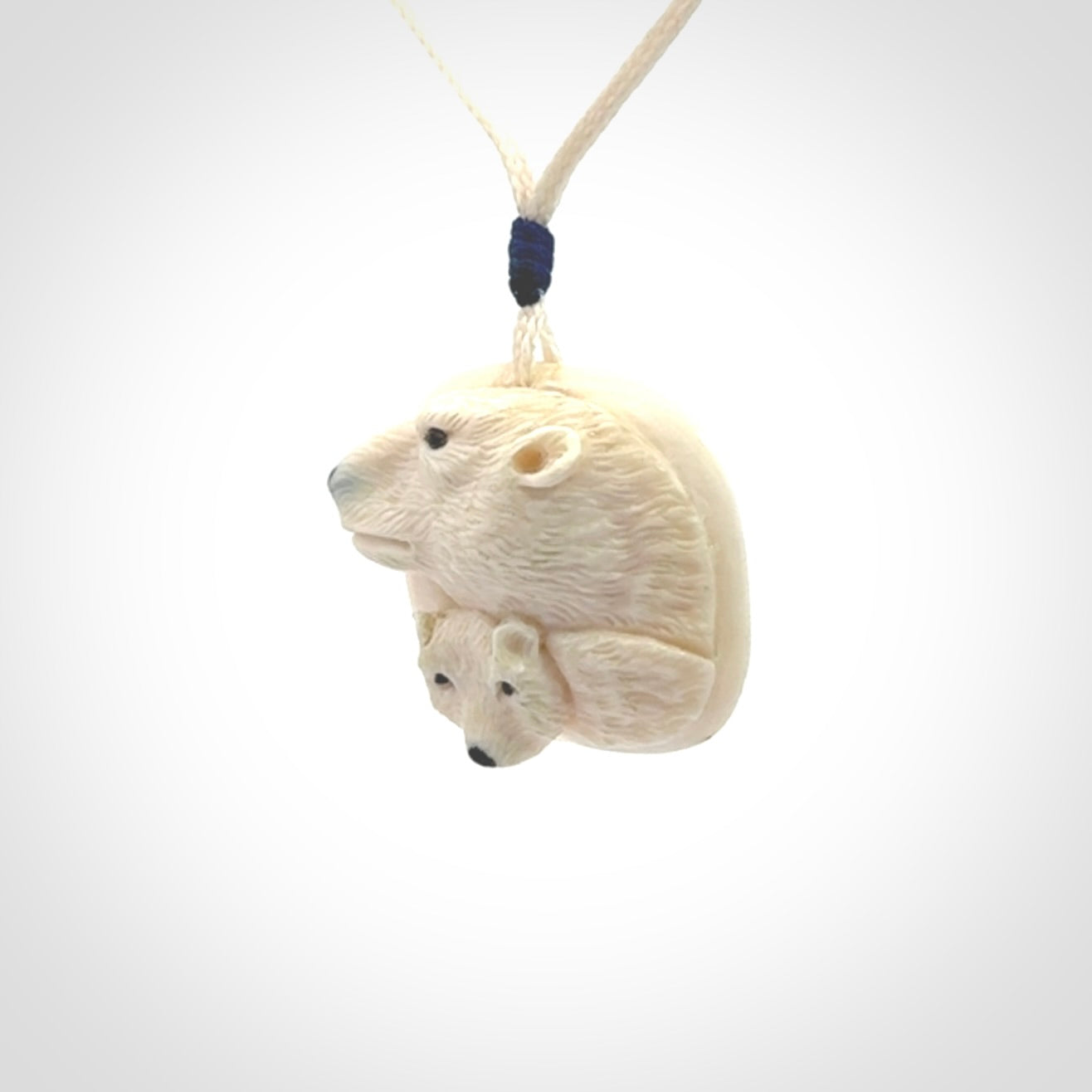 Polar bear pendant Hand Carved in Ancient Woolly Mammoth Tusk