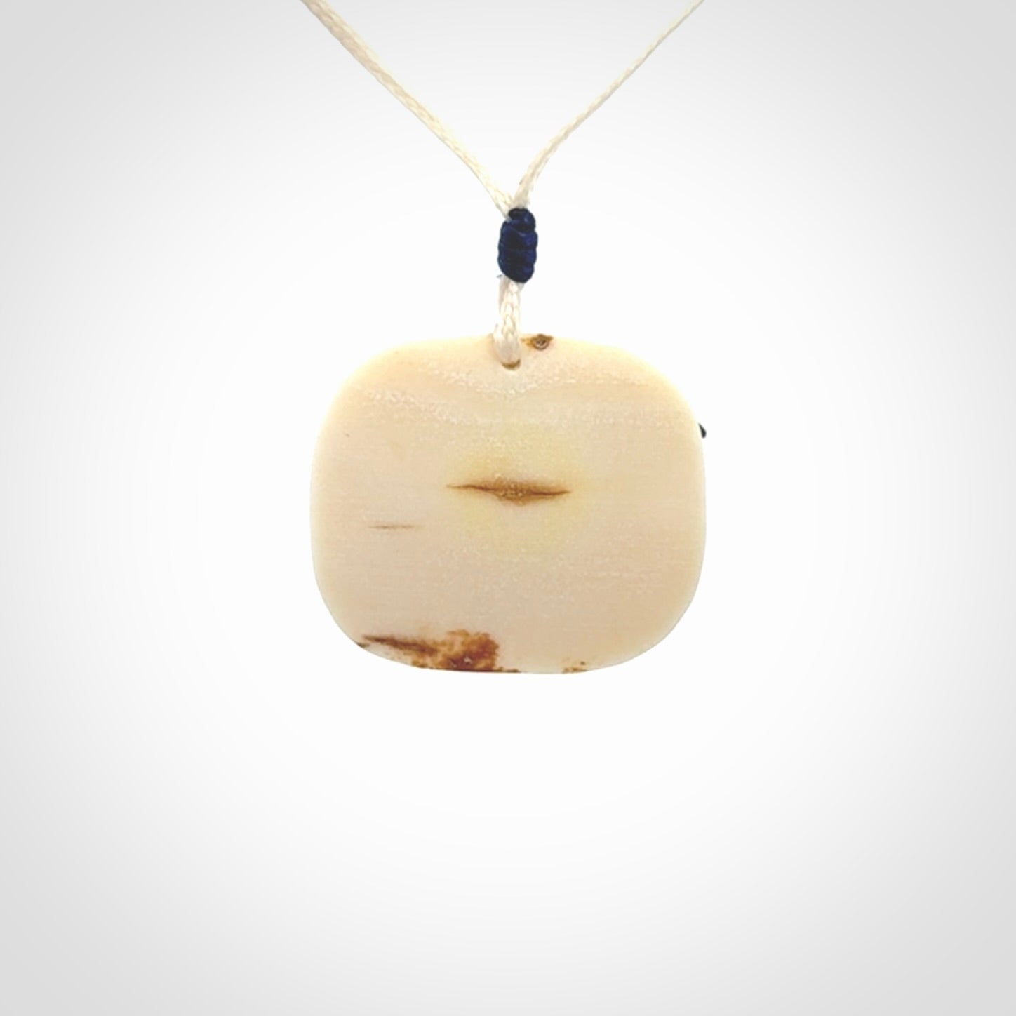 Polar bear pendant Hand Carved in Ancient Woolly Mammoth Tusk