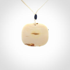 Polar bear pendant Hand Carved in Ancient Woolly Mammoth Tusk