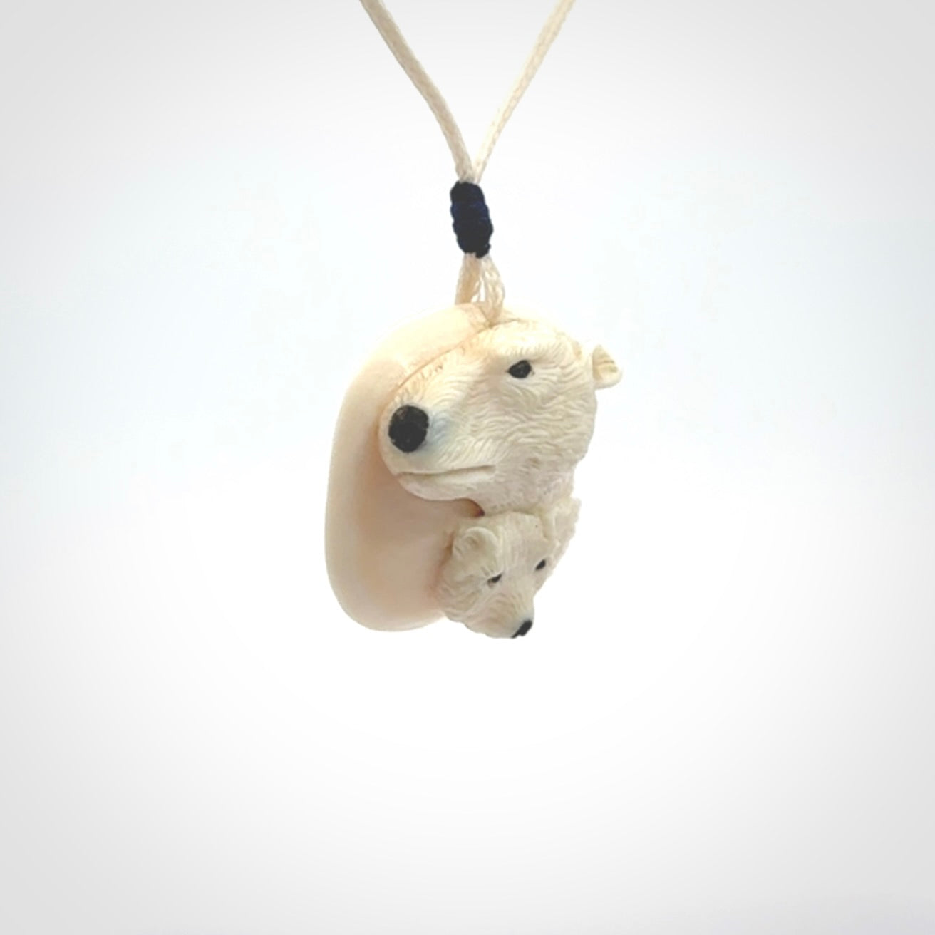 Polar bear pendant Hand Carved in Ancient Woolly Mammoth Tusk