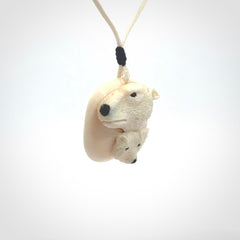 Polar bear pendant Hand Carved in Ancient Woolly Mammoth Tusk