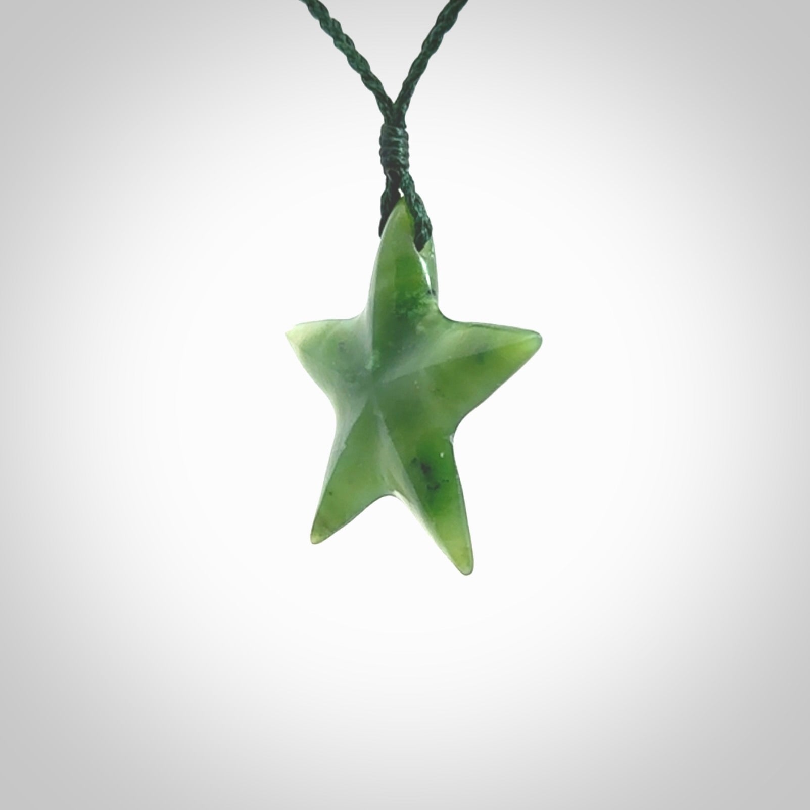 Hand made jade star pendant. Star shaped necklace hand made from Jade, delivered with Express Courier. We provide this pendant on an adjustable cord and packaged in a woven kete pouch.
