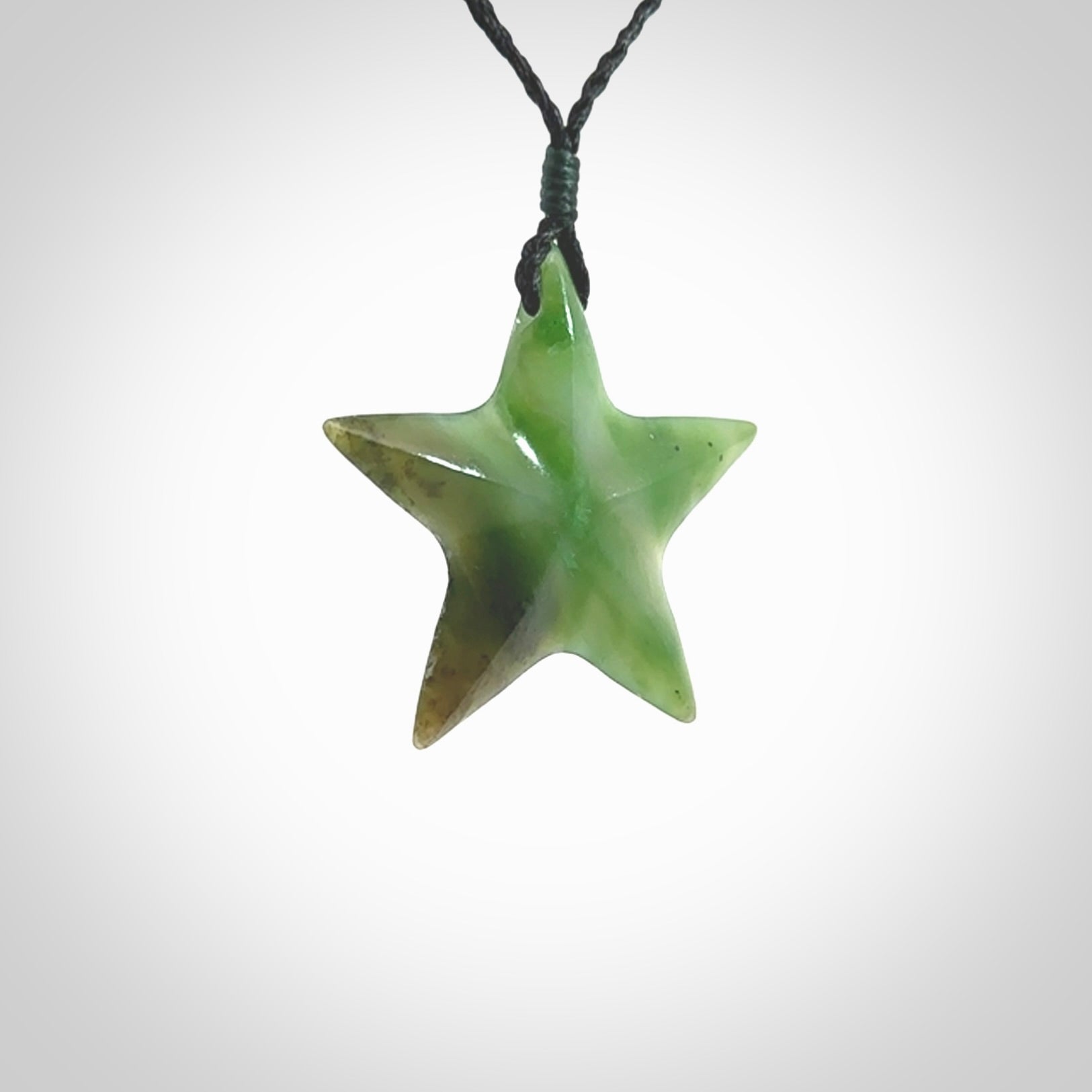 Hand made jade star pendant. Star shaped necklace hand made from Jade, delivered with Express Courier. We provide this pendant on an adjustable cord and packaged in a woven kete pouch.