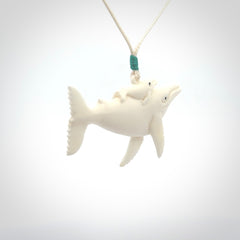 Hand carved bone whale pendant. Carved by NZ Pacific in natural bone.
