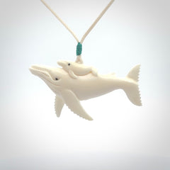 Hand carved bone whale pendant. Carved by NZ Pacific in natural bone.