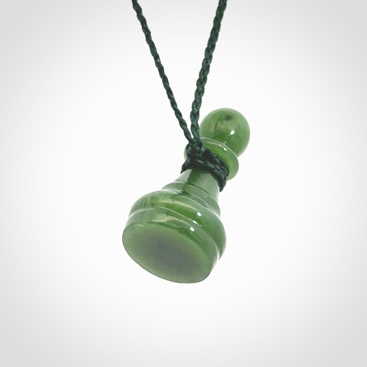Hand carved jade chess pendants. Hand made chess piece necklaces, carved from British Columbian Jade.