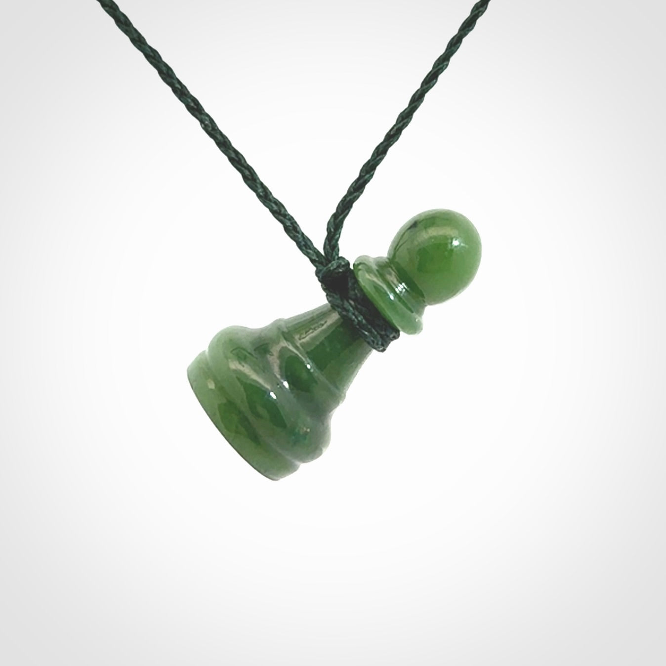 Hand carved jade chess pendants. Hand made chess piece necklaces, carved from British Columbian Jade.